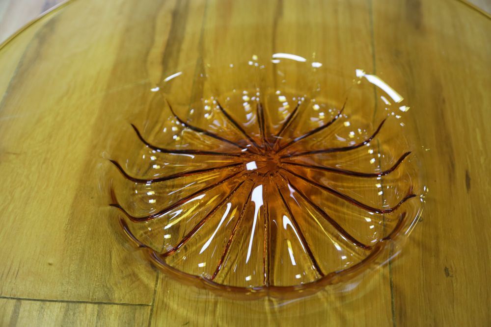 A Murano amber glass charger, circa 1930s, 45cm